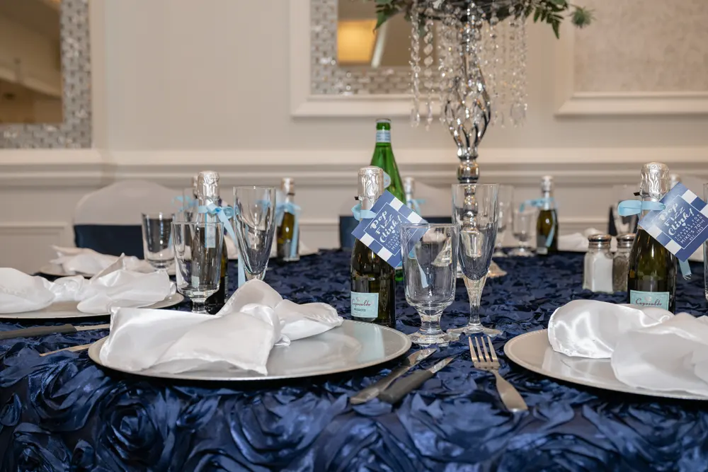 Table setting with rich blue tablecloth